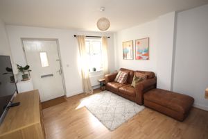 Sitting room to front door- click for photo gallery